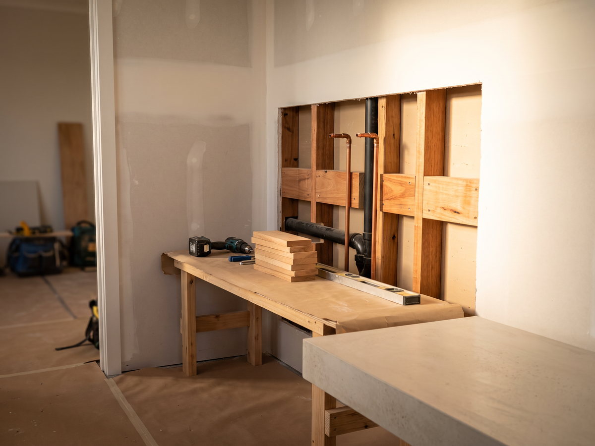 floating vanity cost in New South Wales — SteepWood custom joinery Wall-hung vanity plumbing zone before drawers are fitted in NSW