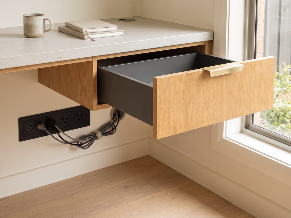 home office joinery cost in New South Wales — SteepWood custom joinery Drawer and cable service void inside custom home office desk