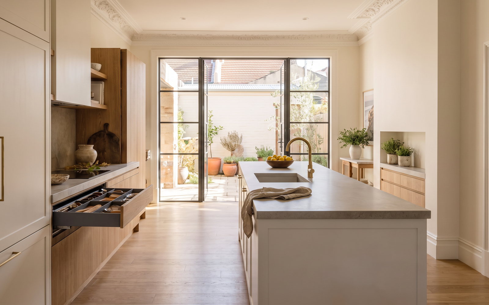 Finished bespoke kitchen with integrated storage in a Woollahra terrace