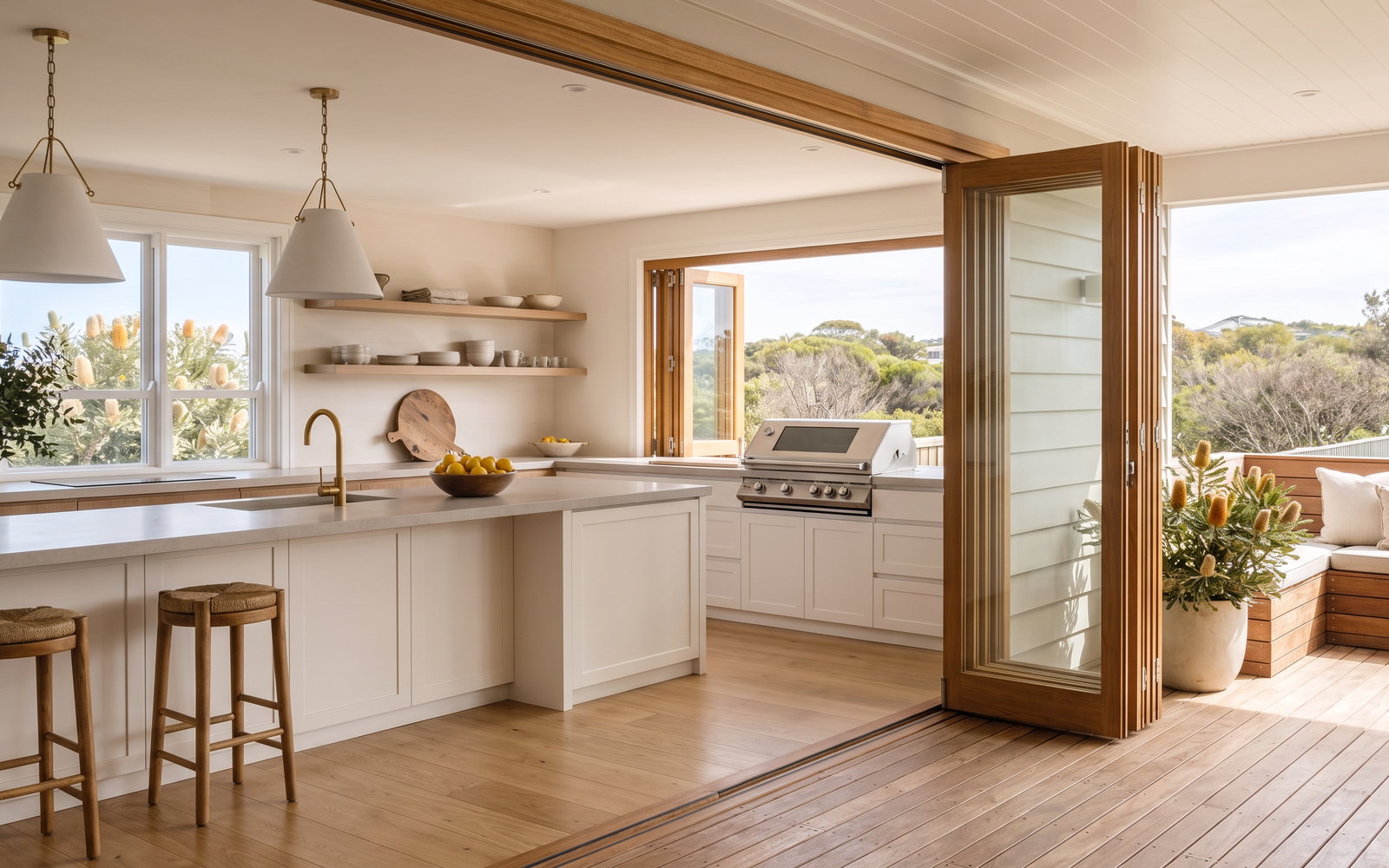 custom joinery Northern Beaches in Northern Beaches, Sydney, New South Wales — SteepWood custom joinery Finished custom kitchen opening toward a sheltered Northern Beaches deck