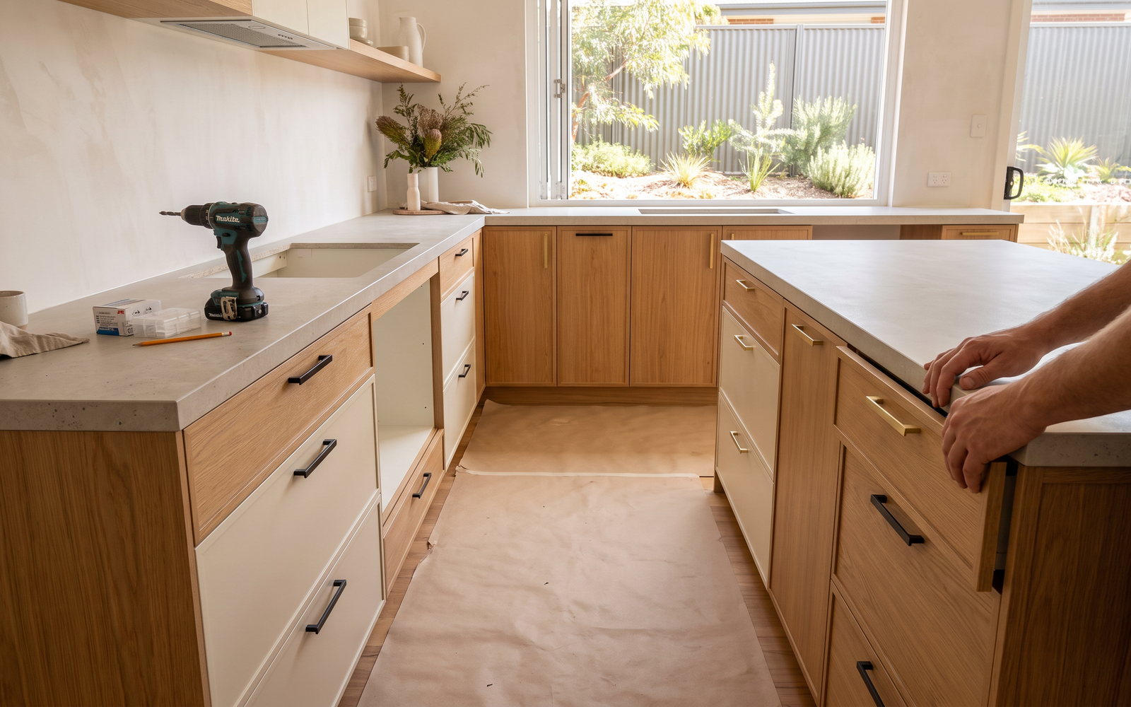 NSW building licence check in New South Wales — SteepWood custom joinery Cabinetmaker installing finished joinery in a Newcastle New South Wales home