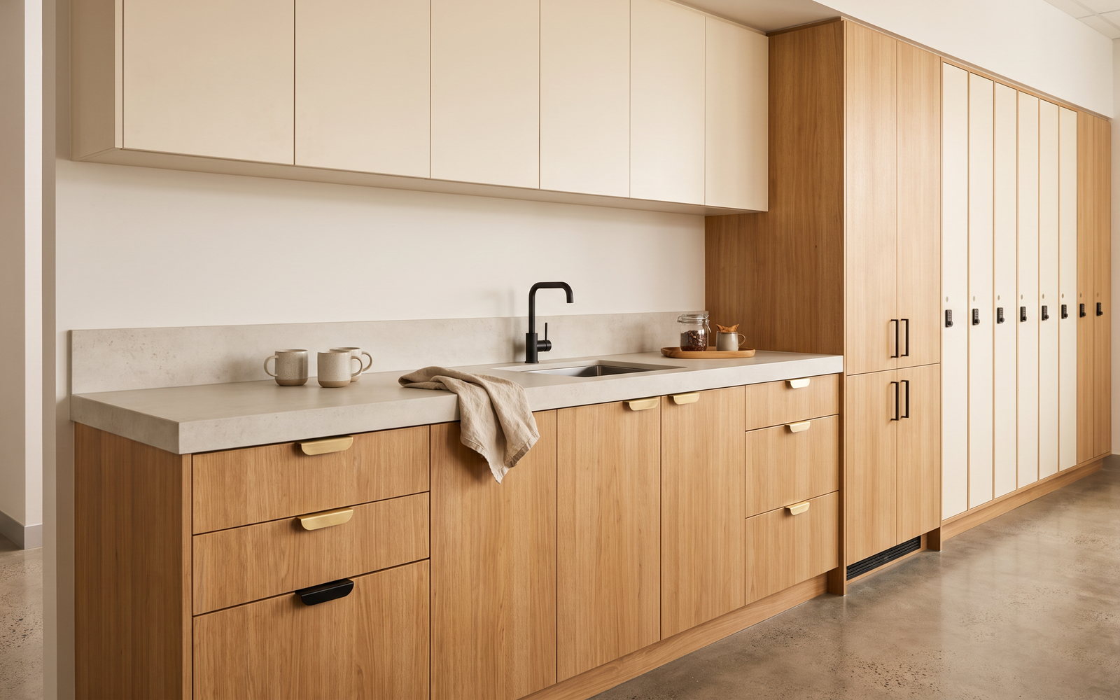 office fitout joinery cost in New South Wales — SteepWood custom joinery NSW office fitout with custom tea point, lockers and timber meeting credenza