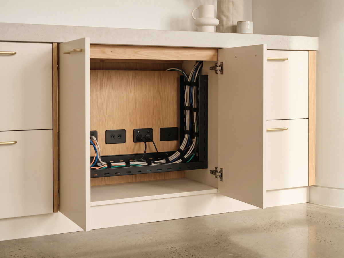 Under-counter power and data service void inside reception joinery