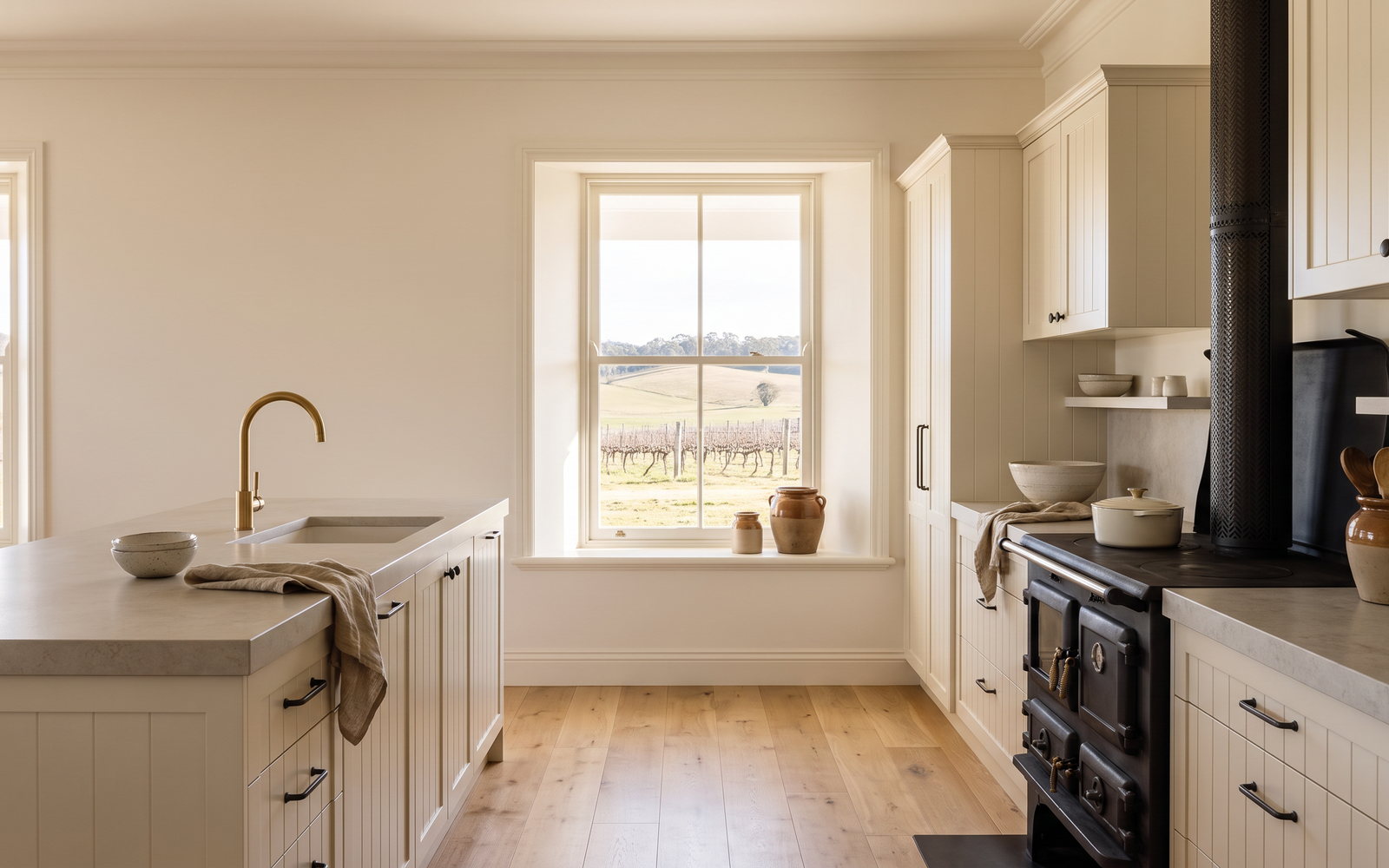 custom joinery Southern Highlands in Southern Highlands and Hunter Valley, New South Wales — SteepWood custom joinery Painted period kitchen joinery beside a wood heater in a Southern Highlands home